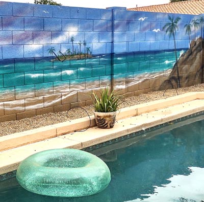 Puesta de sol en la playa, ambiente relajado, mural en el jardín